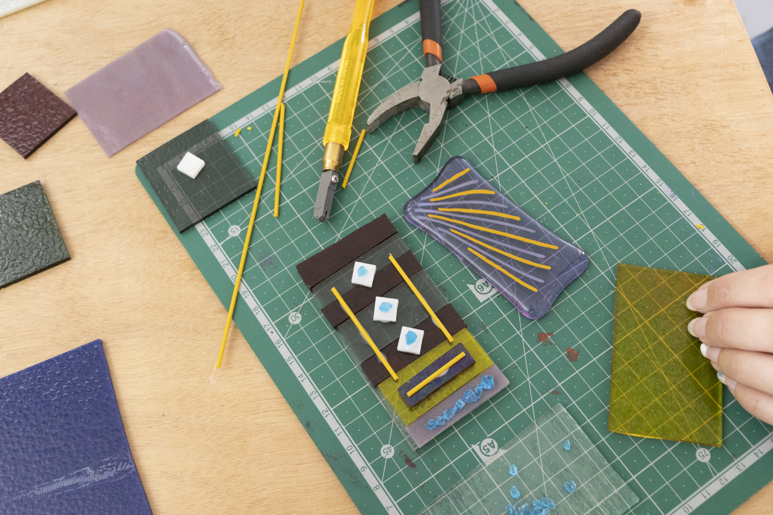 A sleection of tools and materials used in a fused glass course